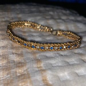 Elegant Gold tone with Blue and clear rhinestones Bracelet